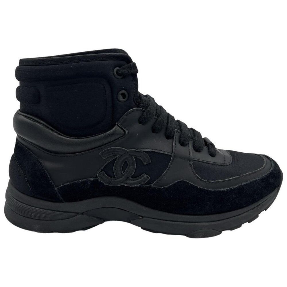 Chanel black high top lambskin and neoprene sneakers